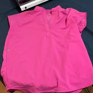 Figs XS over size scrub top. Maybe worn once. But like new.